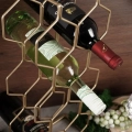 Stojak na wino metalowy złoty 8 butelek 23x48 cm