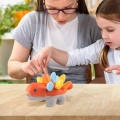 PUZZLE UKŁADANKA DOPASUJ KSZTAŁTY MONTESSORI KSZTAŁTY DINOZAUR SORTER POMARAŃCZOWY