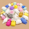 Zestaw MOCHI Squishy Squishies GNIOTKI 50 szt kolorowe miękkie i rozciągliwe figurki antystresowe dla dzieci i dorosłych