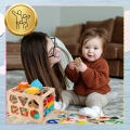 DREWNIANY SORTER KLOCKÓW ELASTYCZNA KOSTKA SENSORYCZNA MONTESSORI GUMKI 12 KLOCKÓW