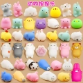 Zestaw MOCHI Squishy Squishies GNIOTKI 50 szt kolorowe miękkie i rozciągliwe figurki antystresowe dla dzieci i dorosłych