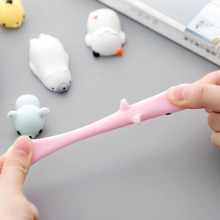 Zestaw MOCHI Squishy Squishies GNIOTKI 50 szt kolorowe miękkie i rozciągliwe figurki antystresowe dla dzieci i dorosłych